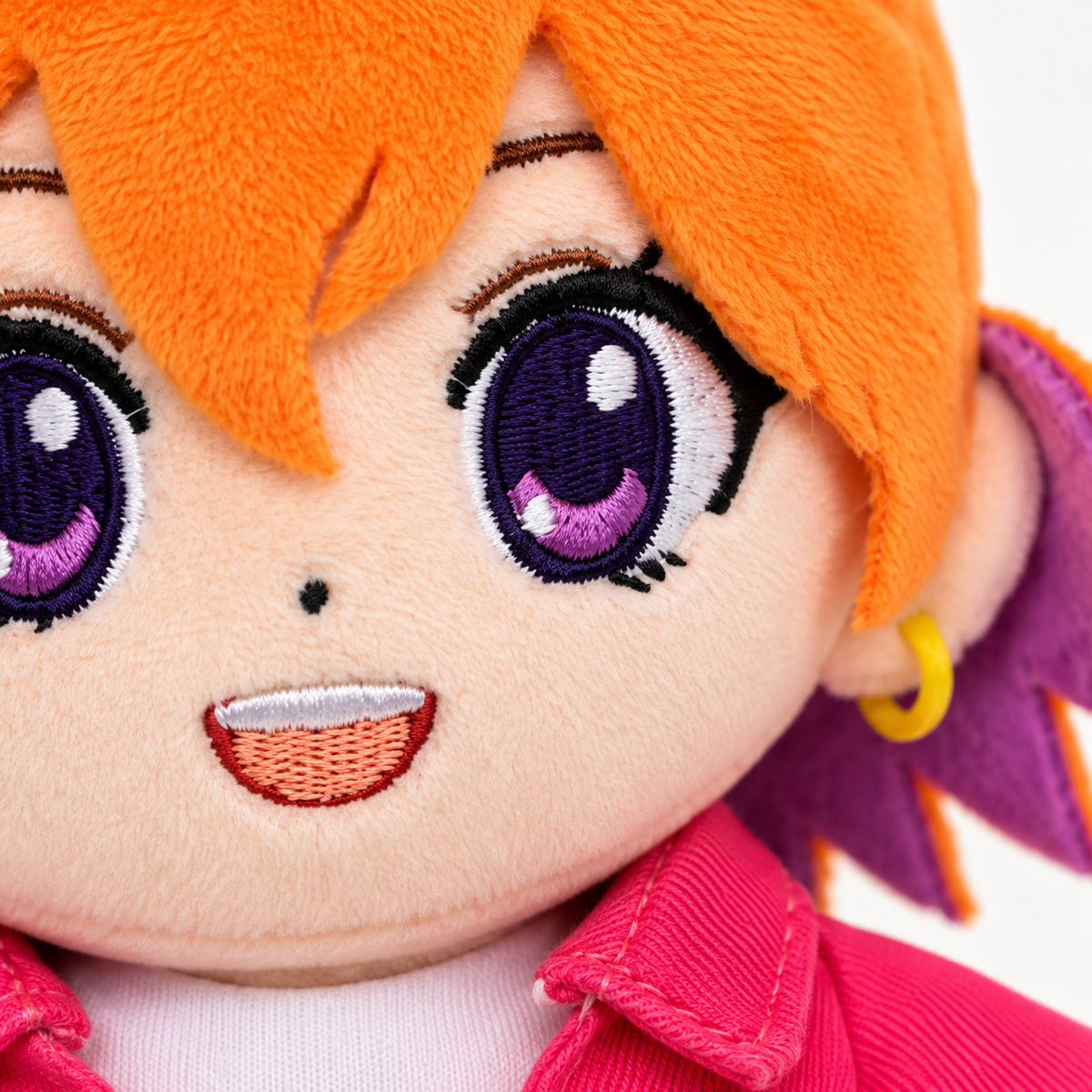 Macro photo of the minky plush fiber and embroidered face